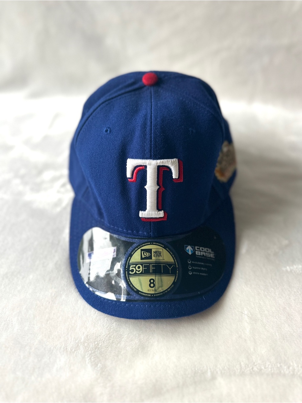 New Era Royal Blue Texas Rangers Fitted Cap with White & Red Logo